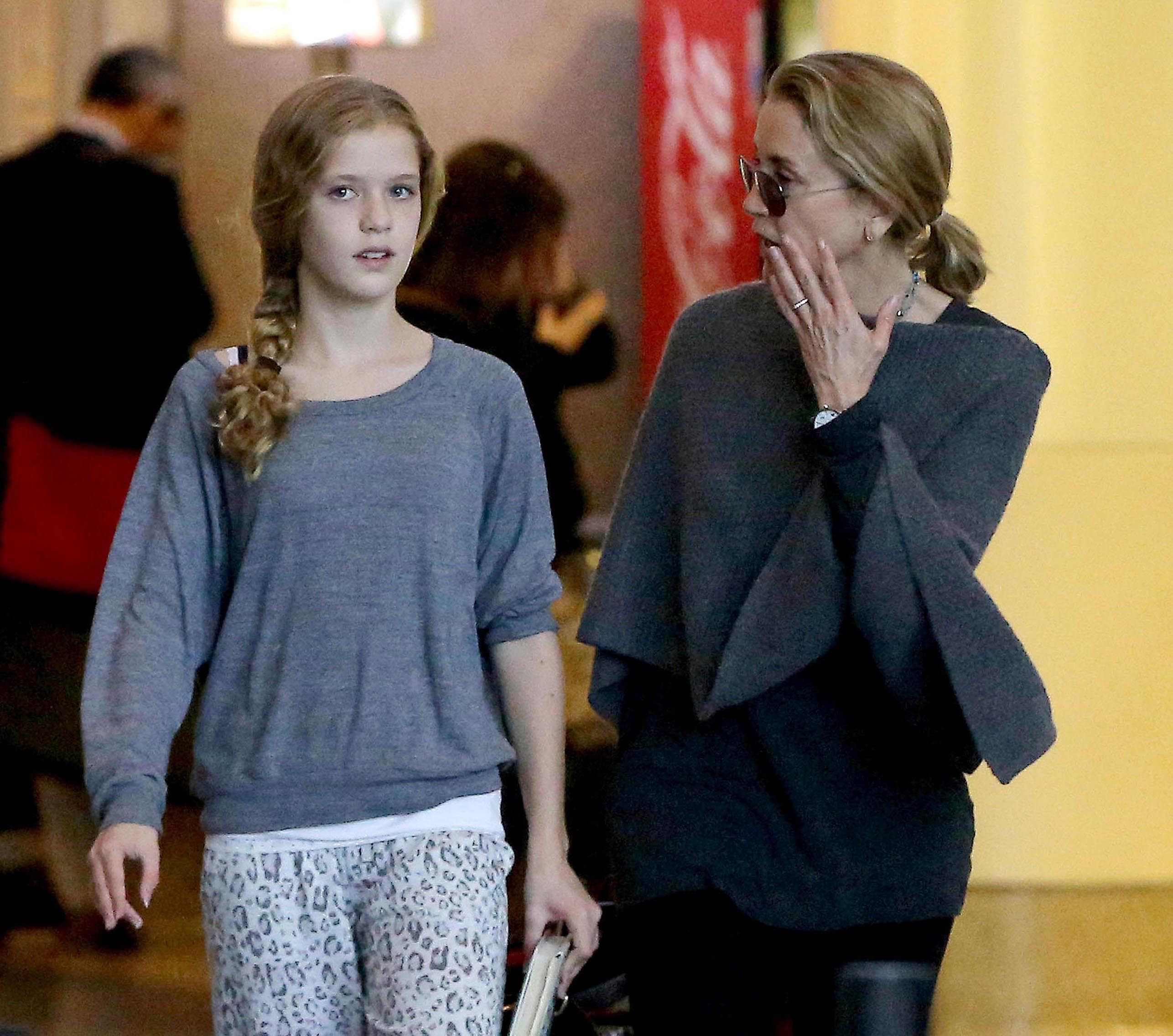 Felicity Huffman Arrives at LAX Airport with daughter in Los Angeles (November 11, 2013) 