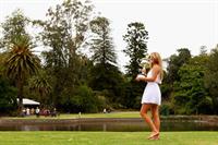 Victoria Azarenka poses with Memorial Cup after winning the 2013 Australian Open January 27, 2013 