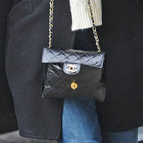 Zooey Deschanel seen out in SoHo holding a Chanel purse. November 16, 2012 