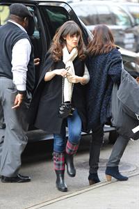 Zooey Deschanel seen out in SoHo holding a Chanel purse. November 16, 2012 