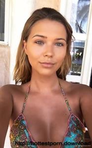 Sandra Kubicka in a bikini taking a selfie