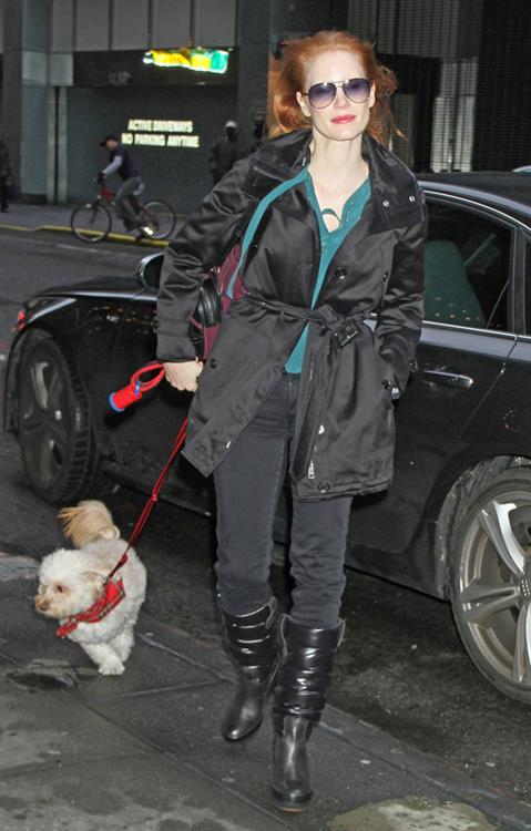 Jessica Chastain with her dog Chaplin arriving to the Walter Kerr Theatre in New York City December 27, 2012 