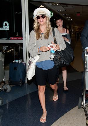 Kaley Cuoco at LAX on April 26, 2012