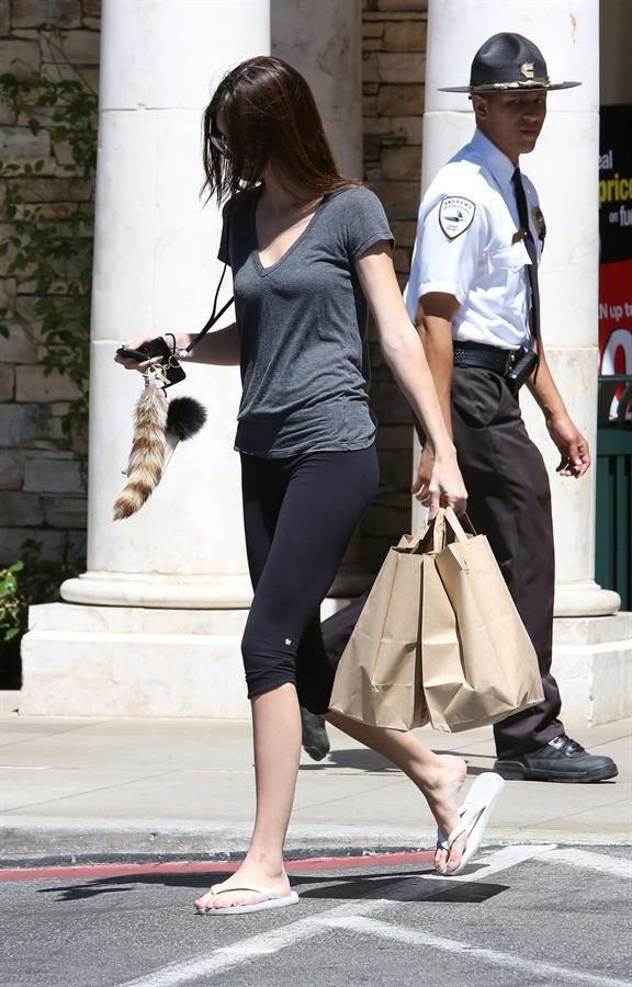 Kendall Jenner Hides her face while strolling through Calabasas on May 29, 2013