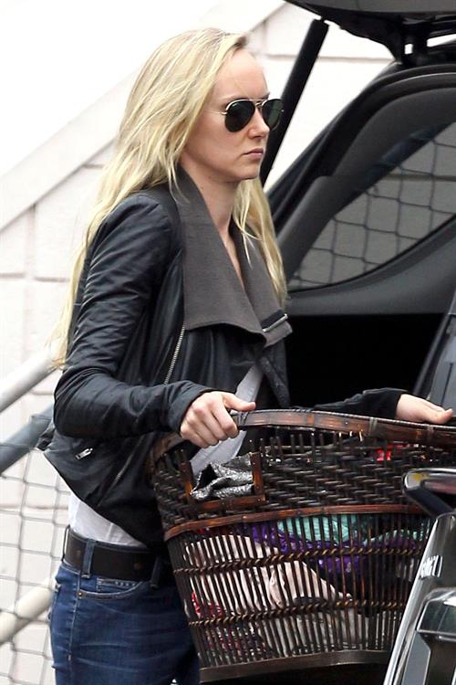 Kimberly Stewart Donating a trunk full of designer clothes at Wasteland in Los Angeles (November 15, 2012) 