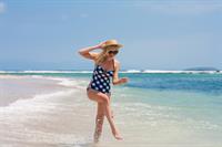 Kirsten Dunst - Bikini Photocall On The Beach In Punta Mita, Mexico June 3, 2012