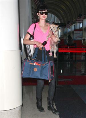 Krysten Ritter - Prepares to leave LAX in Los Angeles, California - June 8, 2012 