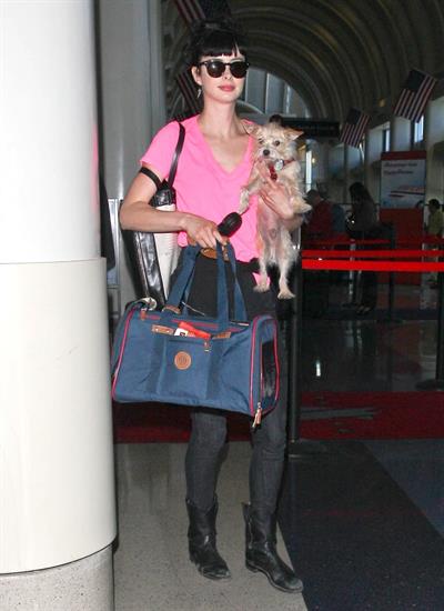 Krysten Ritter - Prepares to leave LAX in Los Angeles, California - June 8, 2012 