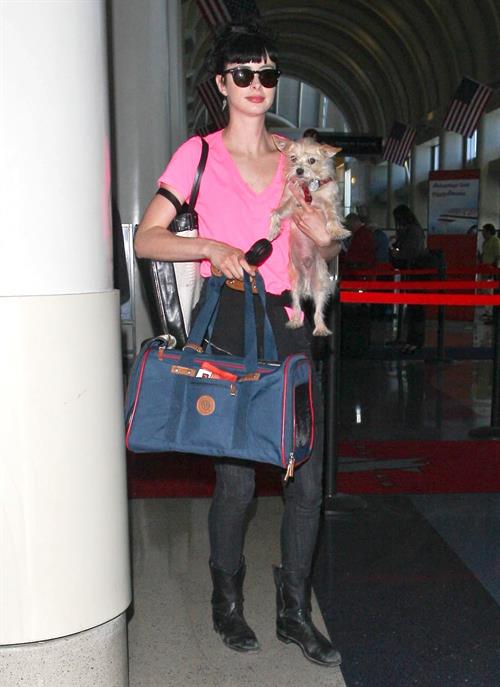 Krysten Ritter - Prepares to leave LAX in Los Angeles, California - June 8, 2012 