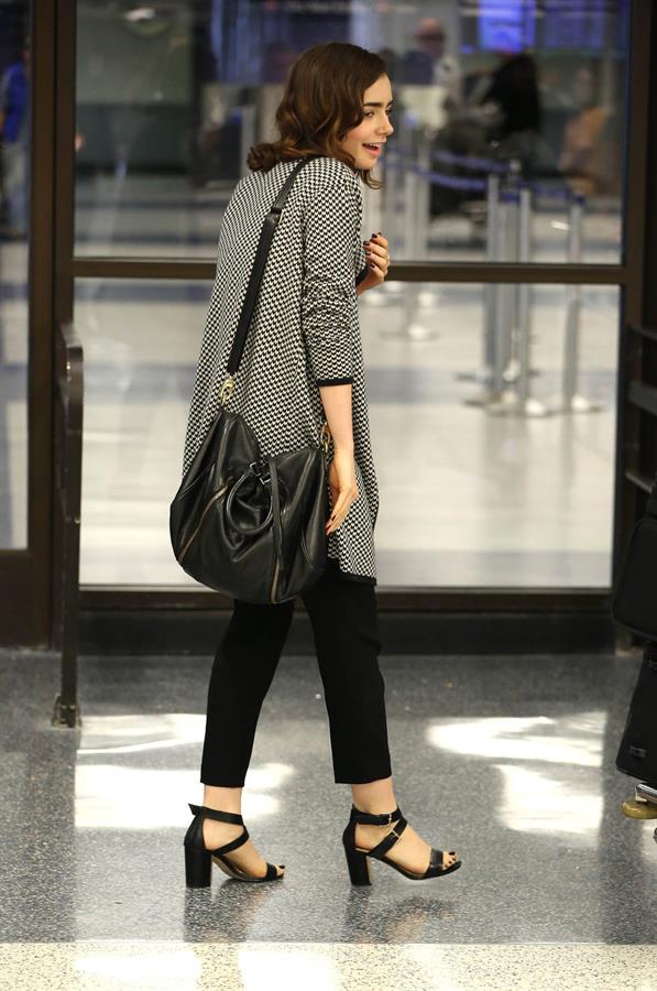 Lily Collins - LAX Airport 8/27/13