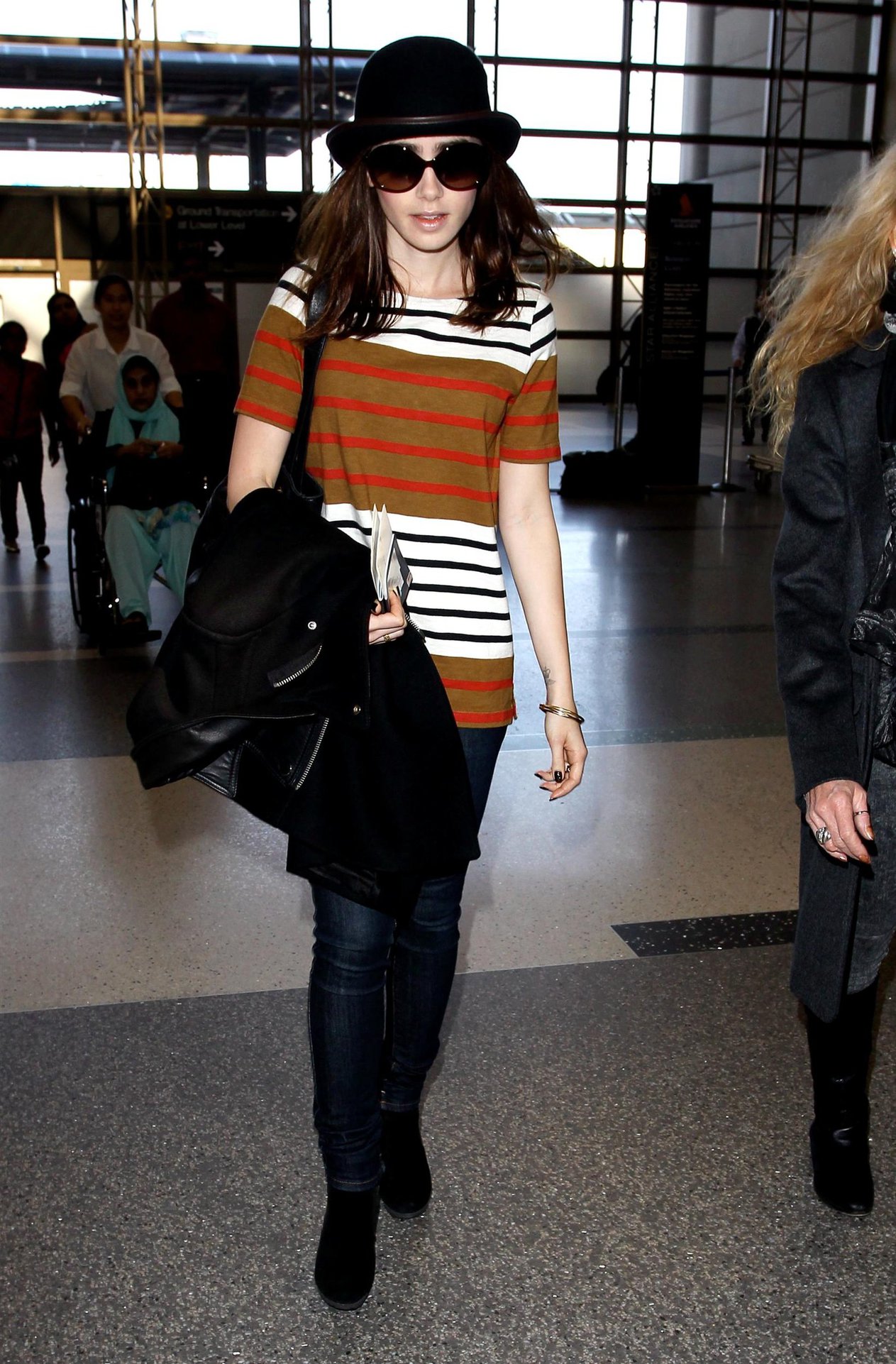 Lily Collins LAX airport in Los Angeles, March 4, 2013 
