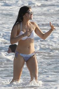 Lucy Hale Bikini Pictures Lucy Hale On the Beach with her boyfriend Graham Rogers and friends, Hawaii, on June 6, 2013