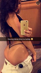 Mónica Alvarez taking a selfie and - ass