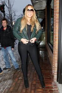 Mariah Carey made another stop at the Louis Vuitton store to shop with a family member. December 24, 2012 