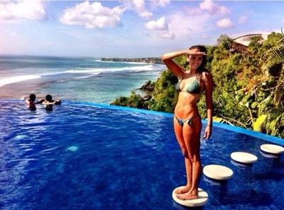 Nina Dobrev in a bikini