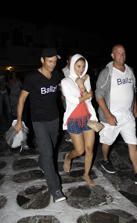 Maria Menounos checks out the Mykonos nightlife clad in a matching Ballz T-shirt (21.06.2013) 