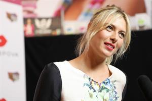 Maria Sharapova poses during Maria Sharapova launches her Sugarpova Candy Collection December 13, 2012 