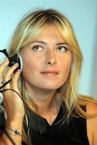 Maria Sharapova attends a press conference to present Saturday's exhibition match Milan November 30, 2012 