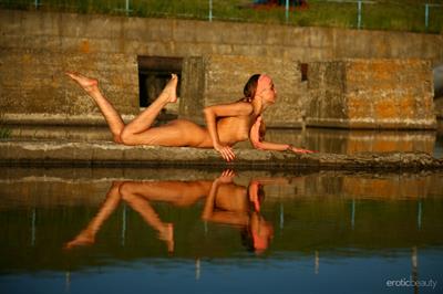 Nida in  Magical Stones  for Erotic Beauty - Nida bares her sexy, tight body as she poses outdoors.