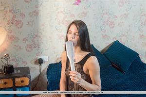 April Pictures April rips her fishnet stockings as she plays with her pussy  Shop, Spank, Enjoy 1  for The Life Erotic