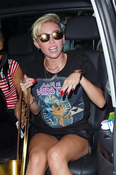 Miley Cyrus Spotted in a Join A Weird Trip T-shirt outside the London Studios in London (18.07.2013) 