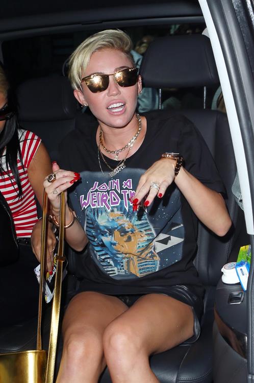 Miley Cyrus Spotted in a Join A Weird Trip T-shirt outside the London Studios in London (18.07.2013) 