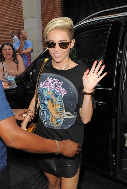Miley Cyrus Spotted in a Join A Weird Trip T-shirt outside the London Studios in London (18.07.2013) 