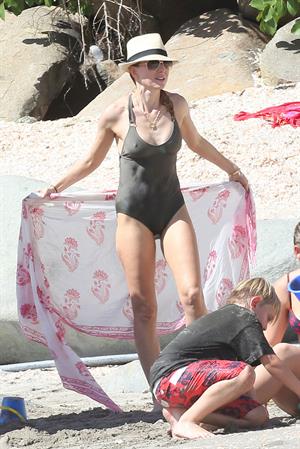 Naomi Watts wearing a swimsuit on the beach in St Barts 12/31/12 