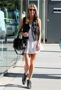 Nicky Hilton in a short white dress while shopping in Beverly Hills March 1, 2013 