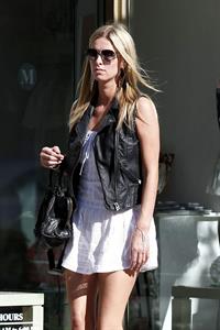 Nicky Hilton in a short white dress while shopping in Beverly Hills March 1, 2013 