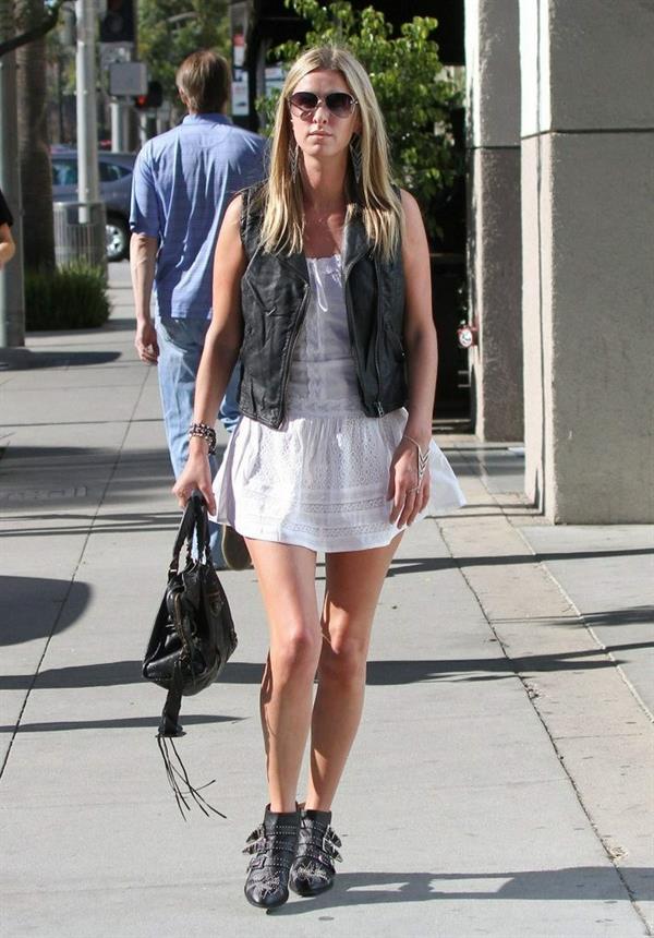 Nicky Hilton in a short white dress while shopping in Beverly Hills March 1, 2013 