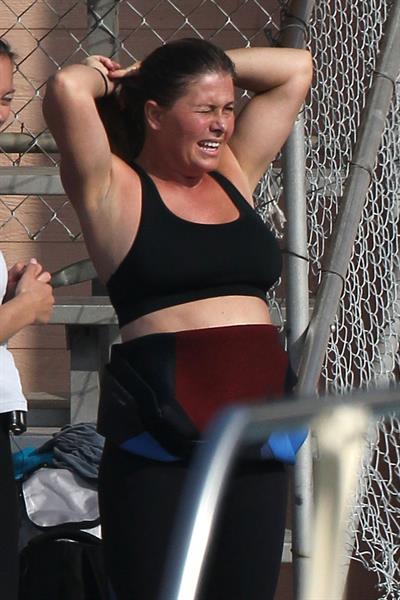 Nicole Eggert prepares for 'Splash' (sports bra/wetsuit) 6.2.2013 
