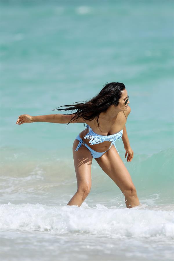 Padma Lakshmi in a bikini on the beach in Miami, Florida - December 8, 2012 