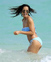Padma Lakshmi in a bikini on the beach in Miami, Florida - December 8, 2012 