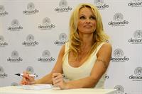 Pamela Anderson  Presents Striplac Nail Polish at Beauty Fair Düsseldorf  March 15, 2013 