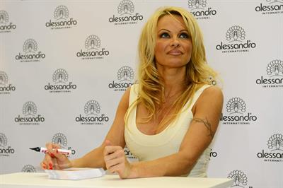 Pamela Anderson  Presents Striplac Nail Polish at Beauty Fair Düsseldorf  March 15, 2013 
