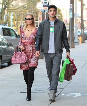 Paris Hilton and River Viiperi shop in Beverly Hills. February 9, 2013 