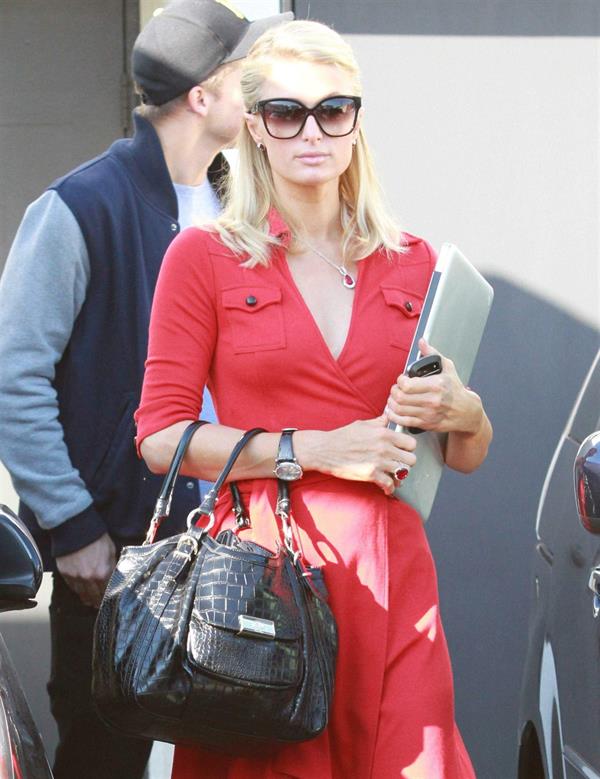 Paris Hilton and River Viiperi leave a shopping trip where Paris gets into her red Ferrari February 13, 2013 