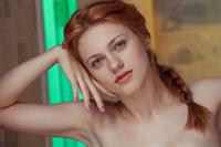 Sexy redhead Shirley Tate shows off her pussy