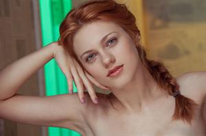 Sexy redhead Shirley Tate shows off her pussy