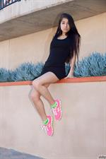 Sporty Megan Salinas in a dress and pink shoes