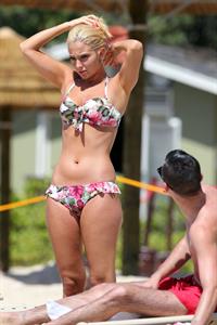 Tulisa Contostavlos in a bikini on the beach in Honolulu July 31, 2012