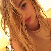 Camila Morrone taking a selfie