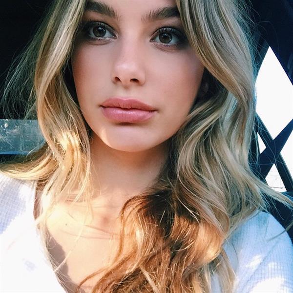 Camila Morrone taking a selfie