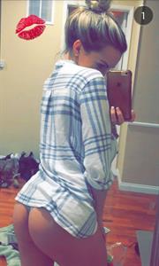 Lindsey Pelas taking a selfie and - ass