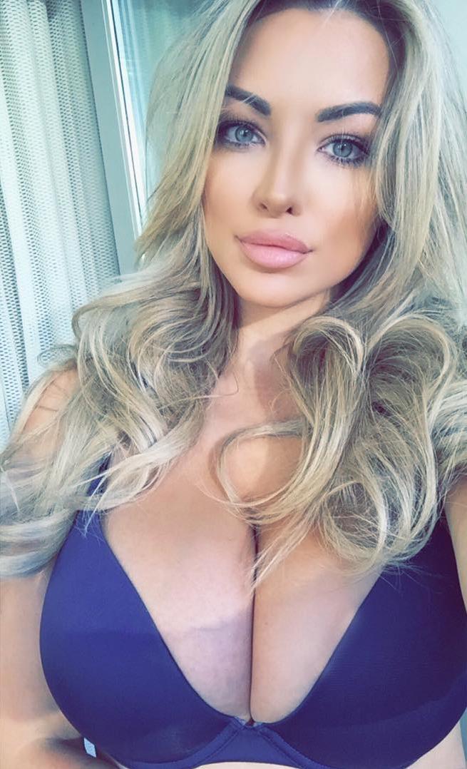 Lindsey Pelas in a bikini taking a selfie
