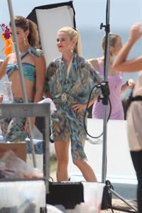Minka Kelly and Rachael Taylor film Charlie's Angels on a beach in Miami 02-09-11