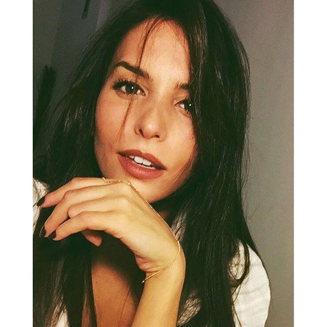 Genesis Rodriguez taking a selfie