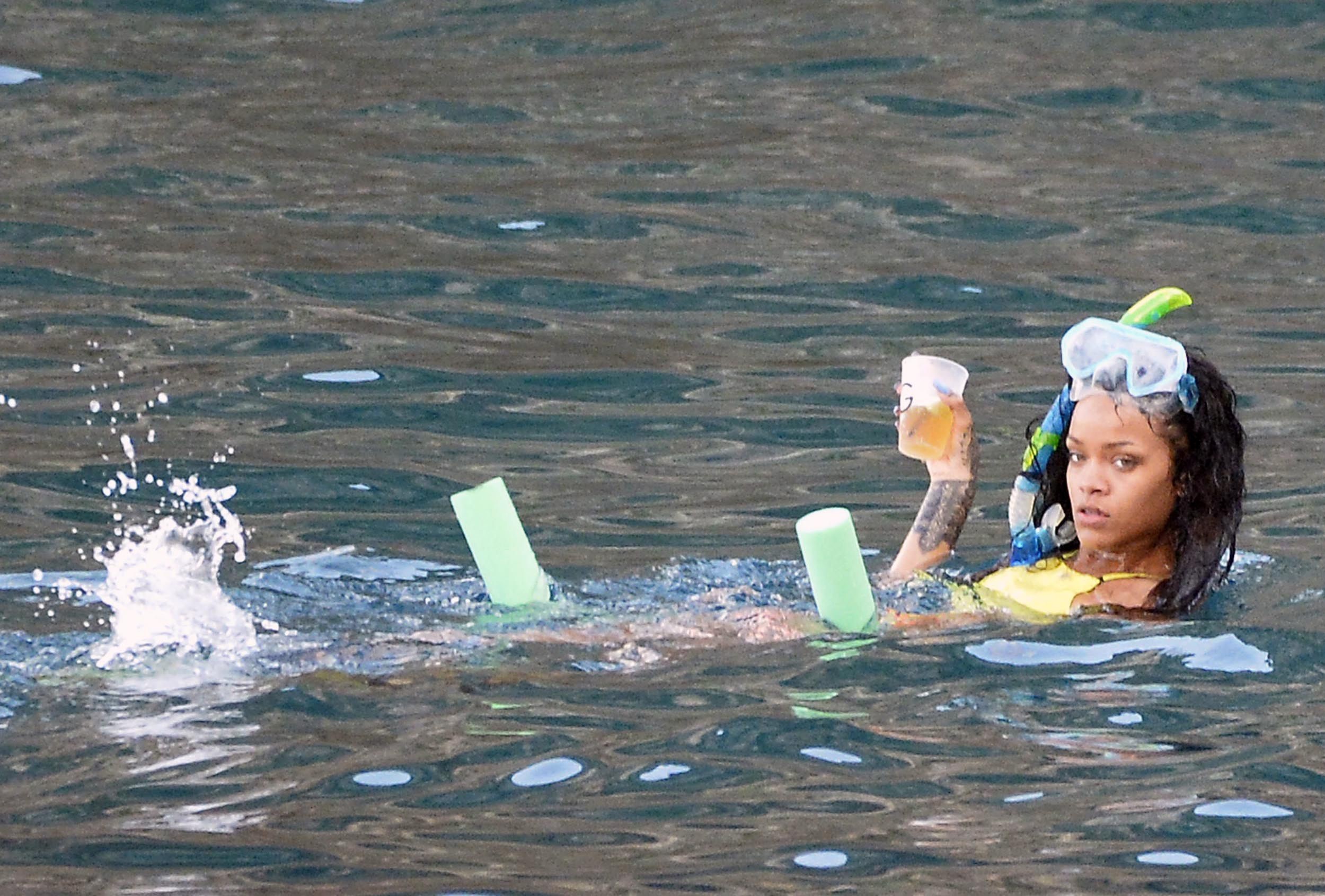 Rihanna enjoying a break on a yacht in Ponza August 29, 2014