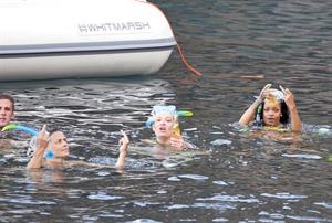 Rihanna enjoying a break on a yacht in Ponza August 29, 2014